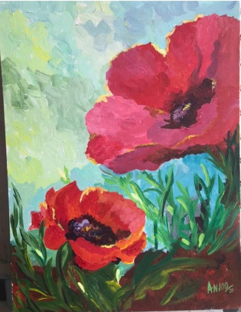 Red poppies against aqua sky