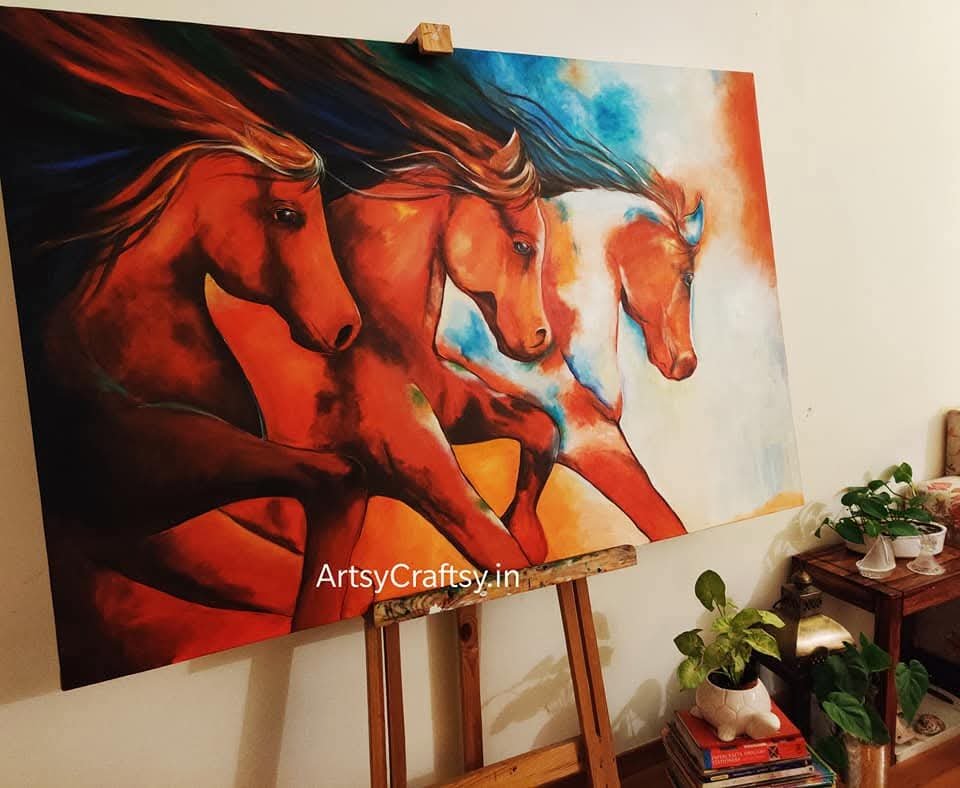 Three chestnut horses painting on easel